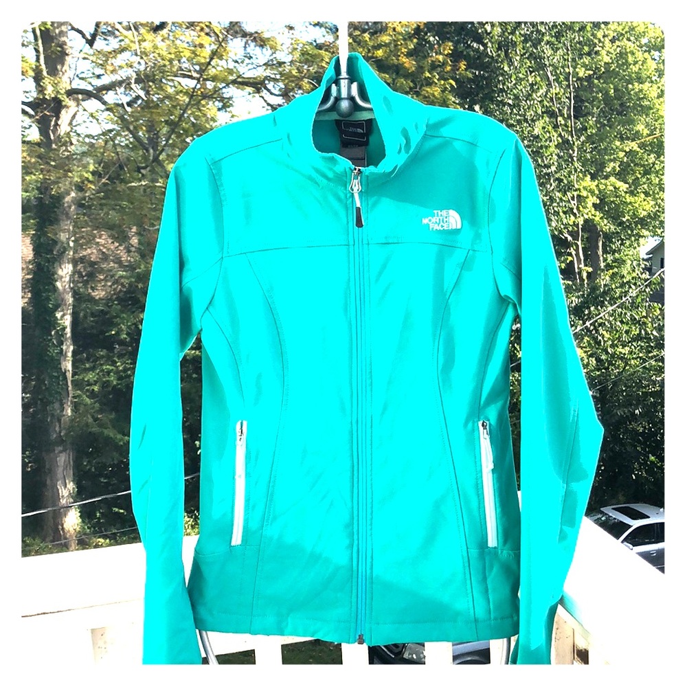 The north face turquoise athletic jacket xs